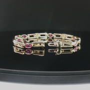 14K YELLOW GOLD PINK SAPPHIRE BRACELET, ESTATE